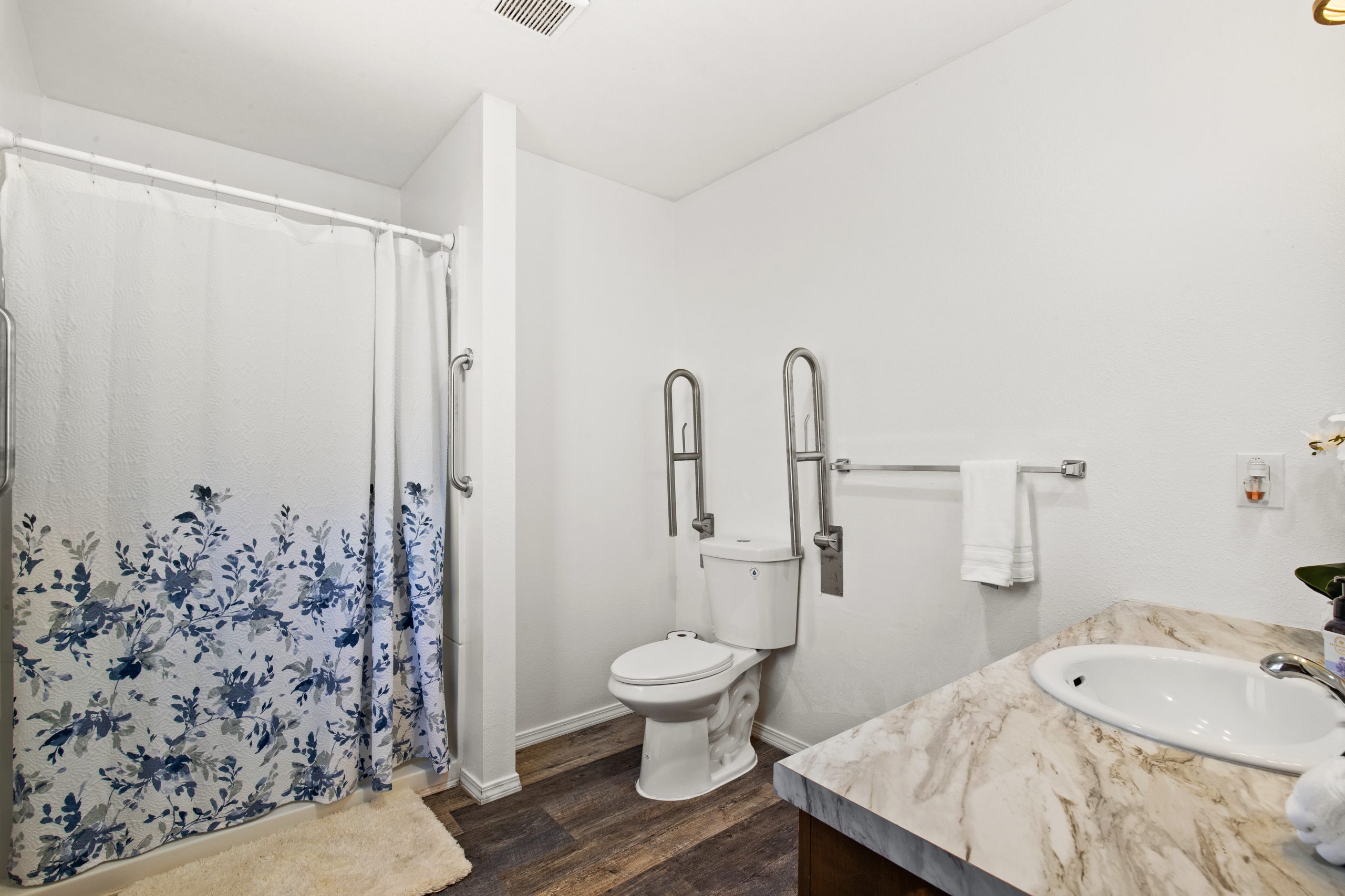 Bathroom with grab bars at Clarkston Care Home